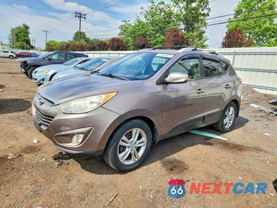2012 HYUNDAI TUCSON GLS KM8JUCAC1CU415808 - główne zdjęcie licytacji z USA - miniatura