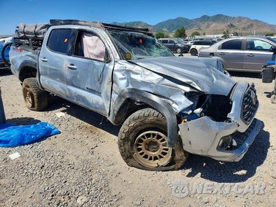 Czwarte zdjęcie samochodu z boku: 2022 TOYOTA TACOMA TRD OFF-ROAD VIN:3TMCZ5AN3NM496927 - miniatura