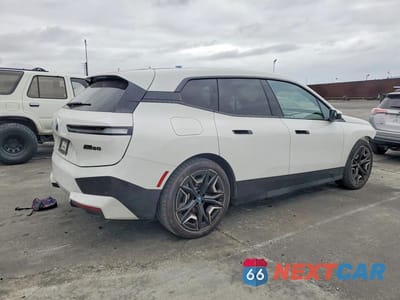 Trzecie zdjęcie samochodu z tyłu: 2023 BMW IX M60 VIN:WB533CF03PCM64126 - miniatura