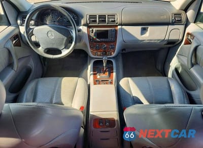 Zdjęcie 8 z 13 samochodu: 2000 MERCEDES-BENZ ML 320 VIN:4JGAB54E9YA174586 - miniatura