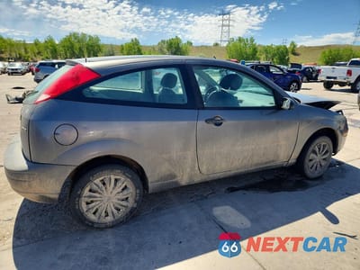 Trzecie zdjęcie samochodu z tyłu: 2006 FORD FOCUS ZX3 VIN:1FAHP31N46W185093 - miniatura
