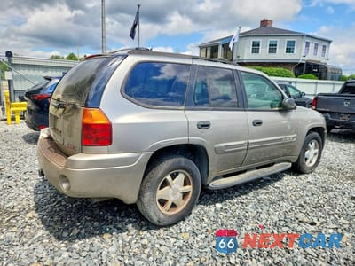 Trzecie zdjęcie samochodu z tyłu: 2002 GMC ENVOY VIN:1GKDT13S322106076 - miniatura