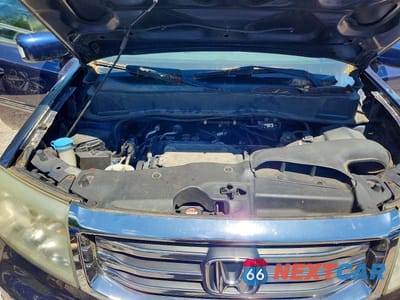 Zdjęcie 12 z 13 samochodu: 2013 HONDA PILOT TOURING VIN:5FNYF4H96DB048959 - miniatura