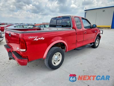 Trzecie zdjęcie samochodu z tyłu: 2000 FORD F150 VIN:1FTRX18L5YKB02966 - miniatura