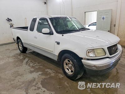 Czwarte zdjęcie samochodu z boku: 2002 FORD F150 VIN:1FTRX17W02NC09344 - miniatura
