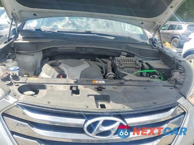 Zdjęcie 12 z 13 samochodu: 2014 HYUNDAI SANTA FE SPORT 2.0T VIN:5XYZU3LA0EG150919 - miniatura