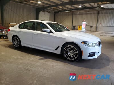 Czwarte zdjęcie samochodu z boku: 2019 BMW 530XE VIN:WBAJB1C5XKB376057 - miniatura