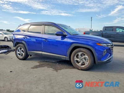 Czwarte zdjęcie samochodu z boku: 2022 HYUNDAI TUCSON SEL VIN:5NMJB3AEXNH138923 - miniatura