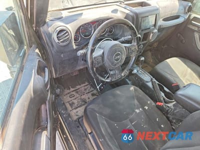 Zdjęcie 8 z 13 samochodu: 2016 JEEP WRANGLER SPORT VIN:1C4AJWAG8GL137258 - miniatura