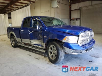Czwarte zdjęcie samochodu z boku: 2014 RAM 1500 LARAMIE VIN:1C6RR7JT7ES401305 - miniatura
