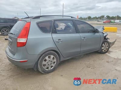 Trzecie zdjęcie samochodu z tyłu: 2010 HYUNDAI ELANTRA TOURING GLS VIN:KMHDC8AEXAU074047 - miniatura