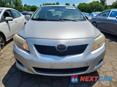Piąte zdjęcie samochodu w środku: 2010 TOYOTA COROLLA LE VIN:1NXBU4EE7AZ356959 - miniatura