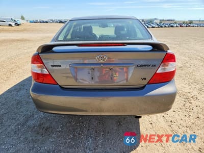 Zdjęcie 6 z 12 samochodu: 2002 TOYOTA CAMRY LE V6 VIN:JTDBF30K920033818 - miniatura