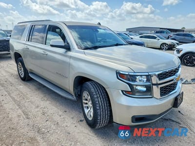 Czwarte zdjęcie samochodu z boku: 2015 CHEVROLET SUBURBAN K1500 LT VIN:1GNSKJKC7FR277711 - miniatura