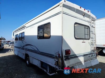 Trzecie zdjęcie samochodu z tyłu: 2003 FORD E450 RV VIN:1FDXE45S33HB84692 - miniatura