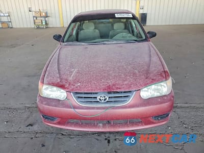 Piąte zdjęcie samochodu w środku: 2001 TOYOTA COROLLA CE VIN:1NXBR12E91Z457859 - miniatura