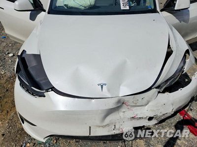 Zdjęcie 11 z 12 samochodu: 2023 TESLA MODEL Y VIN:7SAYGDEE6PF672573 - miniatura