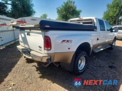 Czwarte zdjęcie samochodu z boku: 2003 FORD F350 SUPER DUTY VIN:1FTWW33P33ED30046 - miniatura