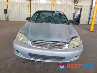 Piąte zdjęcie samochodu w środku: 1999 HONDA CIVIC LX VIN:2HGEJ6676XH546447 - miniatura