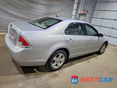 Trzecie zdjęcie samochodu z tyłu: 2009 FORD FUSION SE VIN:3FAHP07189R135503 - miniatura