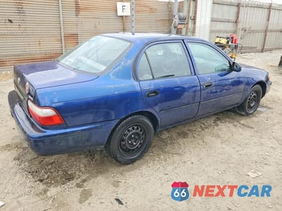 Trzecie zdjęcie samochodu z tyłu: 1997 TOYOTA COROLLA BASE VIN:1NXBA02EXVZ558772 - miniatura