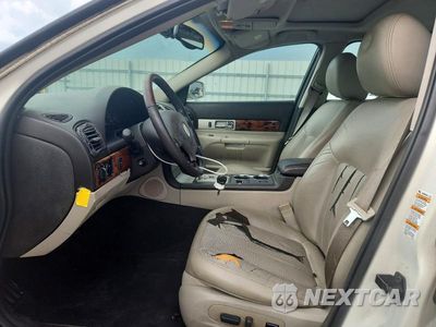 Zdjęcie 7 z 11 samochodu: 2003 LINCOLN LS VIN:1LNHM87A73Y702757 - miniatura
