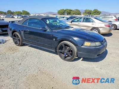 Czwarte zdjęcie samochodu z boku: 2001 FORD MUSTANG VIN:1FAFP44421F200263 - miniatura