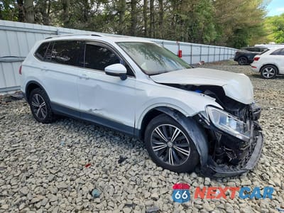 Czwarte zdjęcie samochodu z boku: 2018 VOLKSWAGEN TIGUAN SE VIN:3VV2B7AX4JM003085 - miniatura