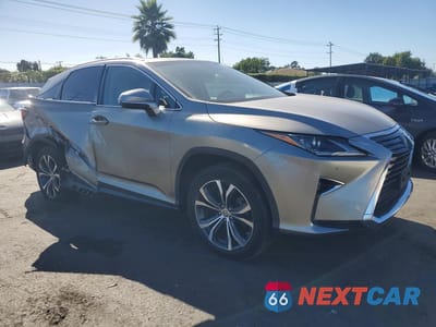 Czwarte zdjęcie samochodu z boku: 2017 LEXUS RX 450H BASE VIN:2T2BGMCA9HC016856 - miniatura