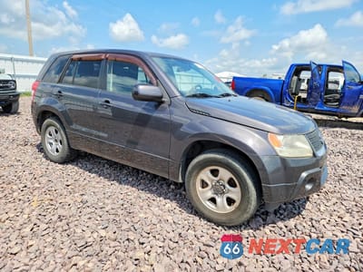 Czwarte zdjęcie samochodu z boku: 2012 SUZUKI GRAND VITARA PREMIUM VIN:JS3TE0D26C4100628 - miniatura