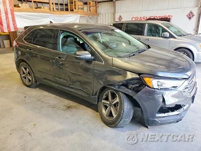 Czwarte zdjęcie samochodu z boku: 2019 FORD EDGE VIN:2FMPK4J93KBC25135 - miniatura