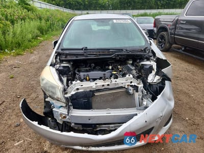 Piąte zdjęcie samochodu w środku: 2012 TOYOTA YARIS 5-DOOR L VIN:JTDKTUD38CD514378 - miniatura