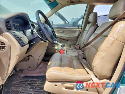 Zdjęcie 7 z 13 samochodu: 2002 HONDA ODYSSEY EX VIN:2HKRL18602H519343 - miniatura