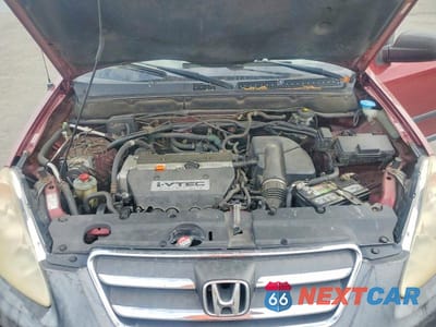 Zdjęcie 12 z 13 samochodu: 2005 HONDA CR-V LX VIN:JHLRD78565C055694 - miniatura