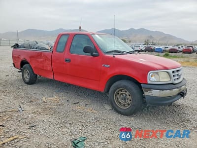 Czwarte zdjęcie samochodu z boku: 1999 FORD F-150 VIN:1FTZX1724XNC04670 - miniatura