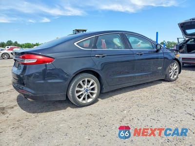 Trzecie zdjęcie samochodu z tyłu: 2017 FORD FUSION SE PHEV VIN:3FA6P0PU7HR332095 - miniatura