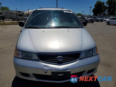 Piąte zdjęcie samochodu w środku: 2001 HONDA ODYSSEY LX VIN:2HKRL18571H531091 - miniatura