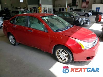 Czwarte zdjęcie samochodu z boku: 2011 FORD FOCUS SE VIN:1FAHP3FNXBW197526 - miniatura