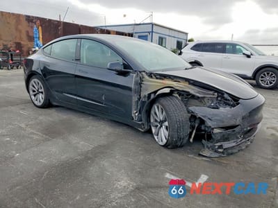 Czwarte zdjęcie samochodu z boku: 2023 TESLA MODEL 3 VIN:5YJ3E1EA0PF448675 - miniatura