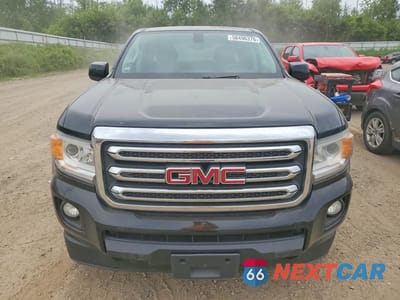Piąte zdjęcie samochodu w środku: 2018 GMC CANYON SLE VIN:1GTG6CEN5J1100786 - miniatura
