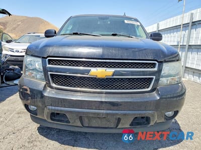 Piąte zdjęcie samochodu w środku: 2011 CHEVROLET SUBURBAN C1500 LT VIN:1GNSCJE05BR359736 - miniatura