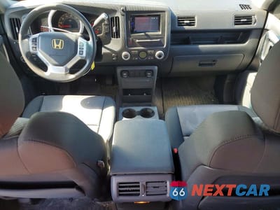 Zdjęcie 8 z 12 samochodu: 2006 HONDA RIDGELINE RTS VIN:2HJYK16496H520744 - miniatura