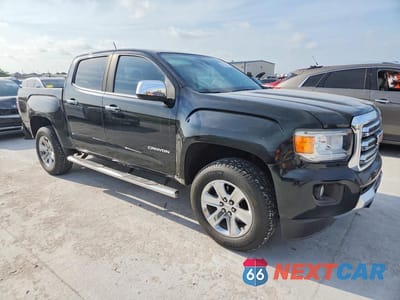 Czwarte zdjęcie samochodu z boku: 2017 GMC CANYON SLT VIN:1GTG5DEN6H1283635 - miniatura