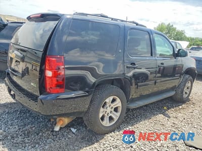 Trzecie zdjęcie samochodu z tyłu: 2012 CHEVROLET TAHOE C1500 LT VIN:1GNSCBE03CR226450 - miniatura