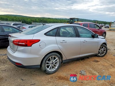 Trzecie zdjęcie samochodu z tyłu: 2018 FORD FOCUS SE VIN:1FADP3F29JL324223 - miniatura