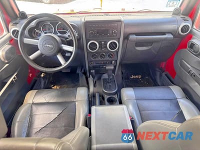 Zdjęcie 9 z 10 samochodu: 2010 JEEP WRANGLER UNLIMITED SAHARA VIN:1J4BA5H16AL215165 - miniatura