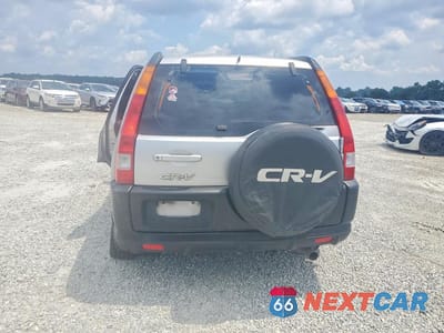 Zdjęcie 6 z 12 samochodu: 2004 HONDA CR-V LX VIN:SHSRD68434U207066 - miniatura