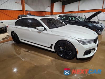Czwarte zdjęcie samochodu z boku: 2016 BMW 750 XI VIN:WBA7B0C52GGF92213 - miniatura