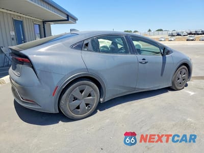 Trzecie zdjęcie samochodu z tyłu: 2024 TOYOTA PRIUS LE VIN:JTDACAAUXR3025423 - miniatura