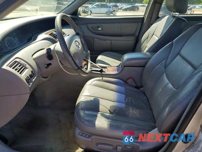 Zdjęcie 7 z 12 samochodu: 2002 TOYOTA AVALON XLS VIN:4T1BF28B32U249263 - miniatura
